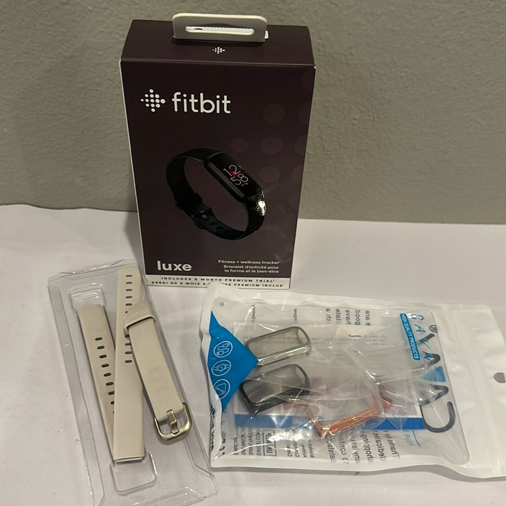 Brand new in box Luxe Fitbit w/ accessories